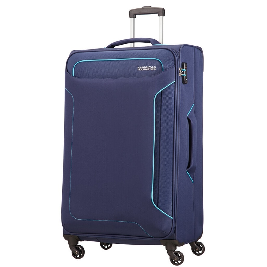 American Tourister HolidayHeat Navy 79 Front3Qrtr 1 jpg