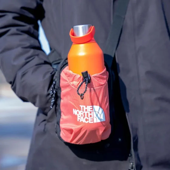 The North Face Bozer Crossbody orange lifestyle jpg